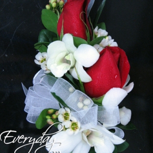 Red Rose Corsage And White Orchids