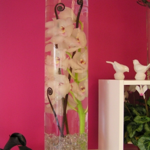 Orchid and Fiddlehead Fern Submerged Centerpiece