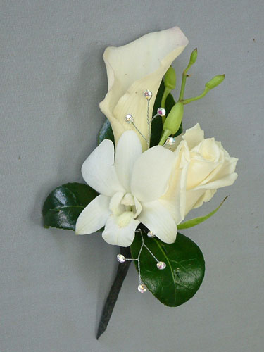 Matching Boutonniere for the white calla corsage
