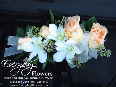 Peach Rose Corsage With White Orchids