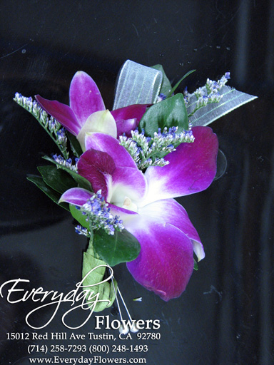 Purple Orchid Boutonniere