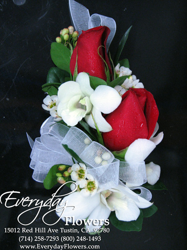 Red Rose Corsage And White Orchids